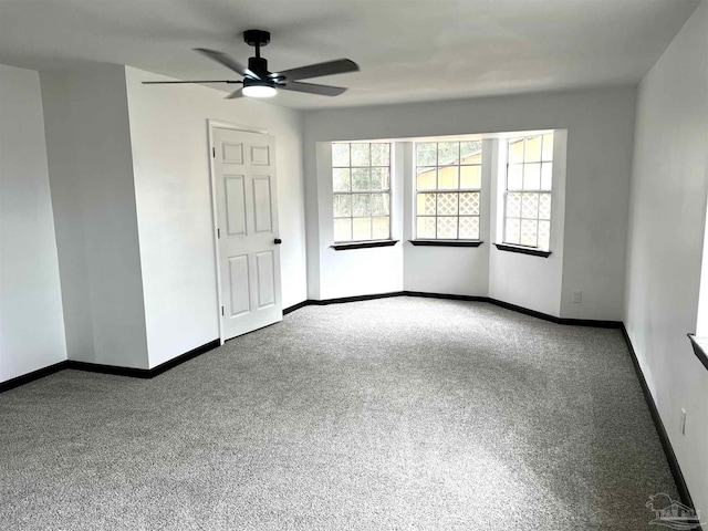 unfurnished bedroom featuring carpet flooring and ceiling fan