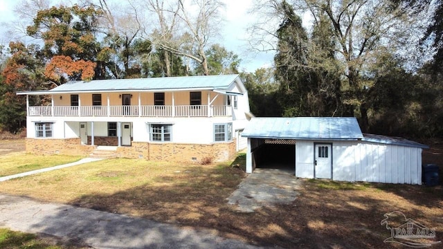 view of front of house with a carport