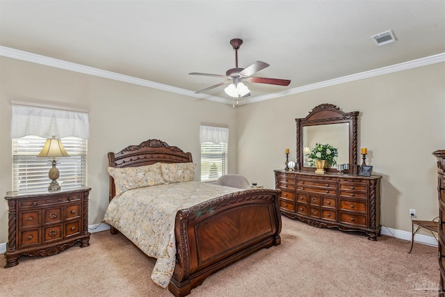 bedroom featuring visible vents, light carpet, baseboards, and crown molding