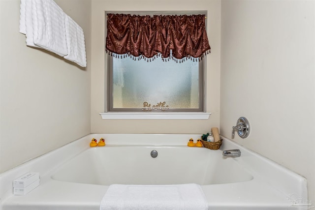 full bathroom with a garden tub