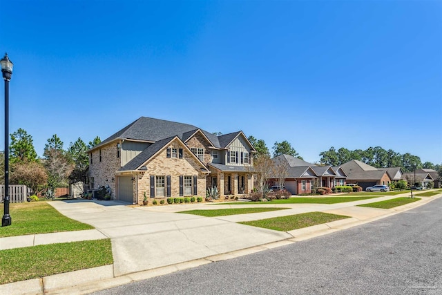 view of front of house with fence, driveway, roof with shingles, a front lawn, and board and batten siding