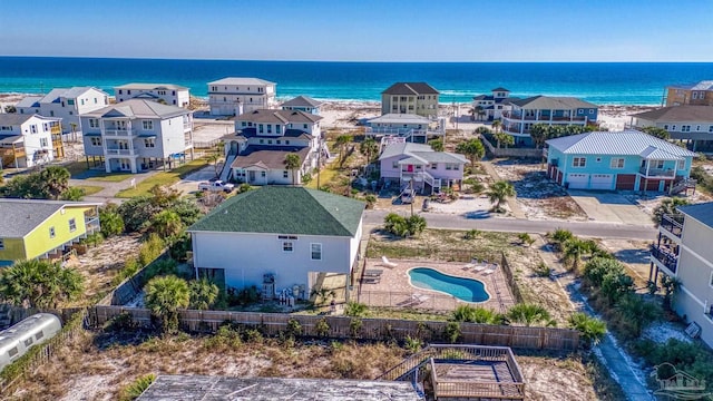 bird's eye view with a water view and a residential view