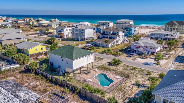 bird's eye view with a water view and a residential view