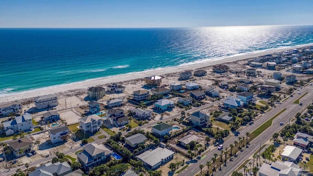 bird's eye view with a view of the beach and a water view