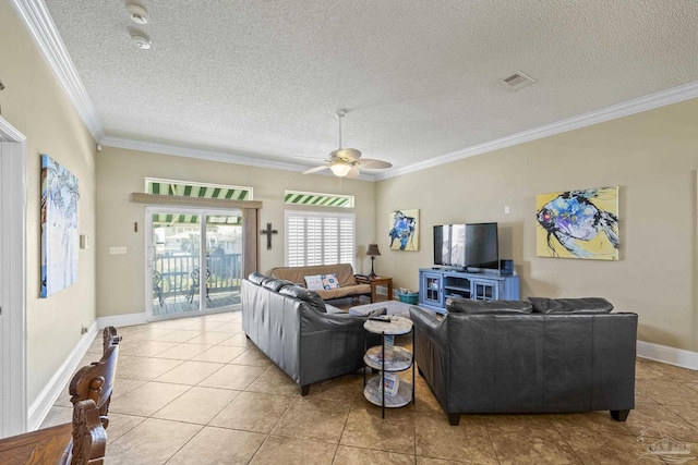 living area featuring a textured ceiling, visible vents, and crown molding