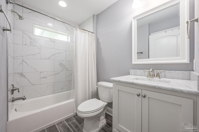 9074 Byrom Campbell Rd, Pace, FL 32571 - full bathroom with toilet, shower / bath combination with curtain, vanity, and wood finish floors