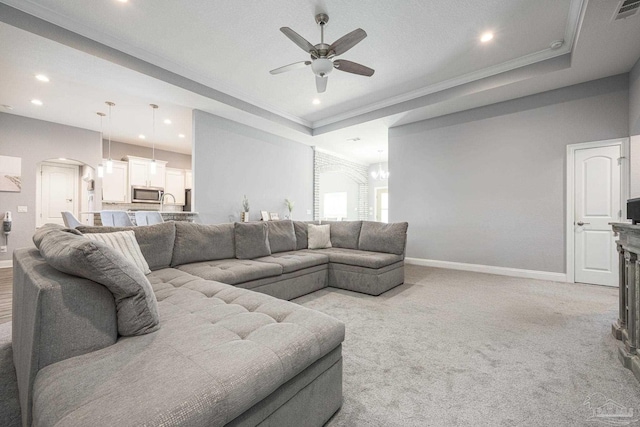 9074 Byrom Campbell Rd, Pace, FL 32571 - living area featuring ceiling fan, recessed lighting, light carpet, baseboards, and arched walkways