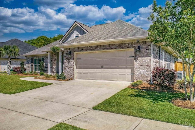 single story home featuring concrete driveway, brick siding, an attached garage, a shingled roof, and a front yard