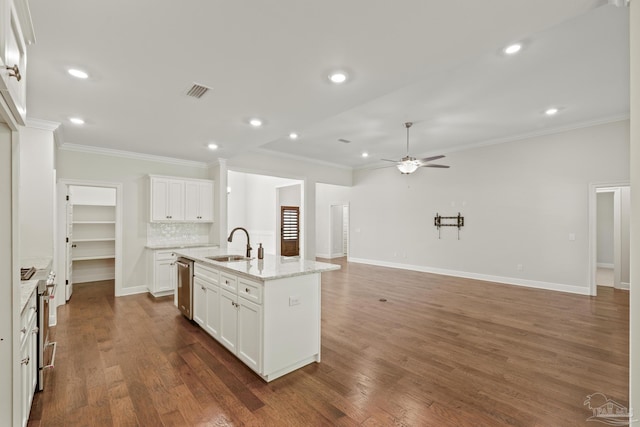 kitchen with white cabinets, crown molding, a ceiling fan, and a sink