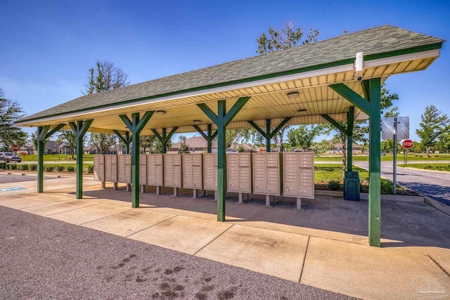 surrounding community with a gazebo and mail area