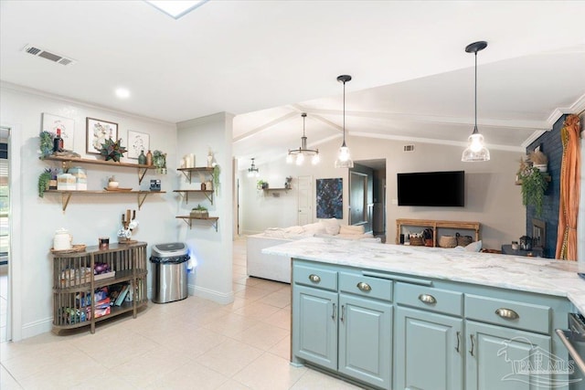 kitchen with light stone counters, ornamental molding, vaulted ceiling, light tile patterned floors, and hanging light fixtures