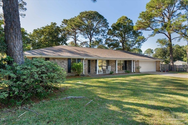 ranch-style house with a front lawn and a garage