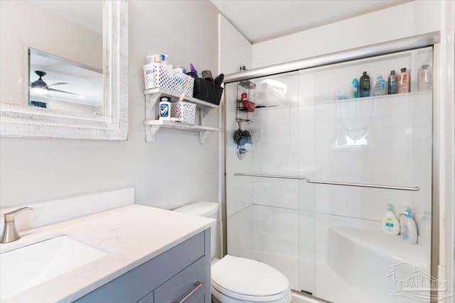 bathroom with vanity, toilet, and walk in shower