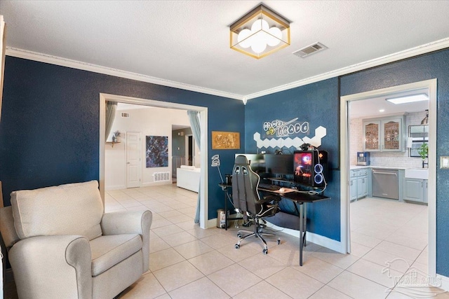 tiled office space featuring a textured ceiling and crown molding