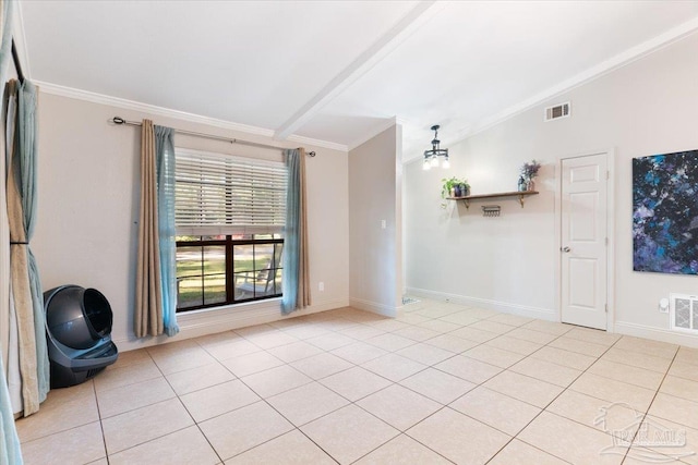 empty room with vaulted ceiling with beams, ceiling fan, light tile patterned floors, and crown molding