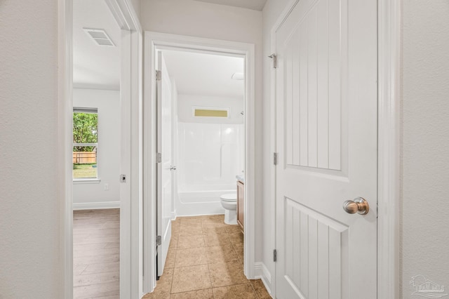 5649 Cane Syrup Cir, Pace, FL 32571 - hallway with visible vents and light tile patterned floors