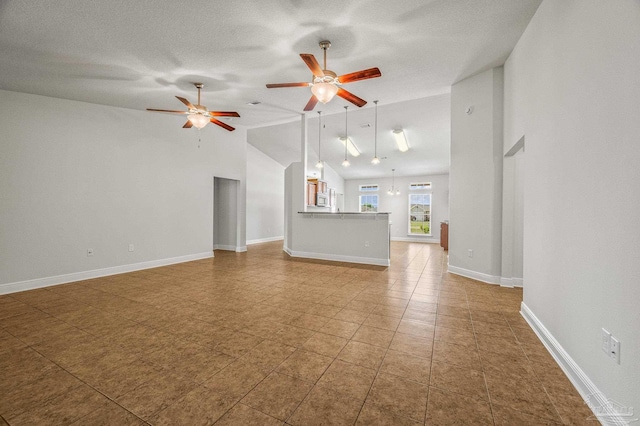5649 Cane Syrup Cir, Pace, FL 32571 - unfurnished living room featuring a textured ceiling, ceiling fan, baseboards, and high vaulted ceiling