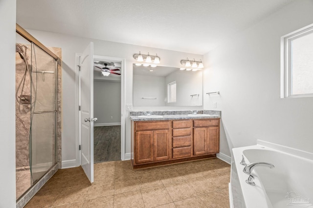 5649 Cane Syrup Cir, Pace, FL 32571 - full bathroom featuring double vanity, a sink, and a stall shower