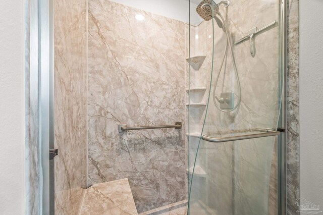 5649 Cane Syrup Cir, Pace, FL 32571 - full bathroom featuring a marble finish shower