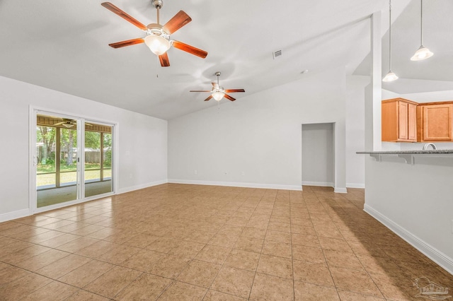 5649 Cane Syrup Cir, Pace, FL 32571 - unfurnished living room featuring ceiling fan, visible vents, baseboards, and lofted ceiling