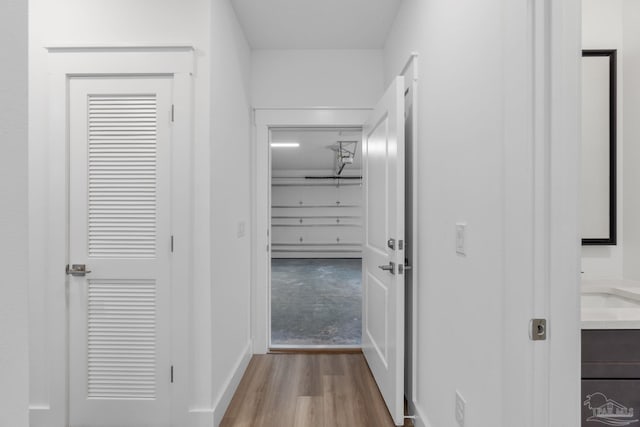 corridor featuring light wood-type flooring