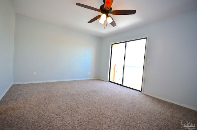unfurnished room featuring carpet floors, ceiling fan, and baseboards