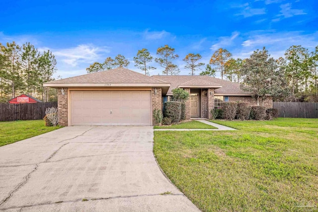 ranch-style house with a garage, brick siding, and fence