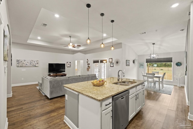 kitchen with sink, stainless steel dishwasher, an island with sink, dark hardwood / wood-style flooring, and white cabinetry