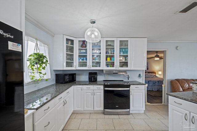 kitchen with white cabinetry, dark stone countertops, decorative light fixtures, and black appliances