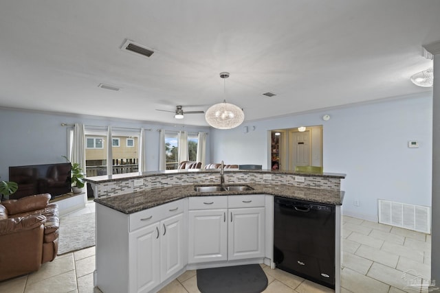 kitchen featuring sink, a center island with sink, dishwasher, pendant lighting, and white cabinets