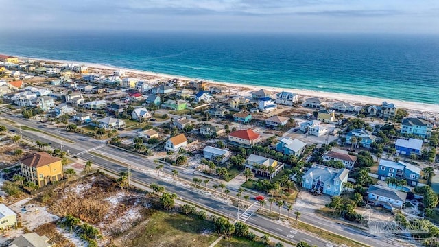 aerial view featuring a water view and a beach view