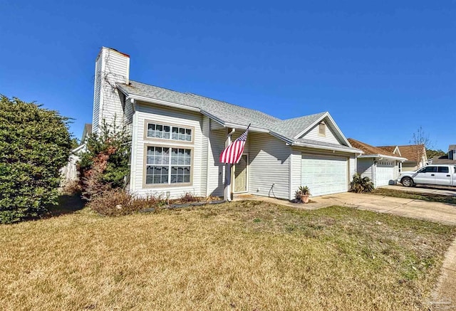 ranch-style home with a garage and a front yard