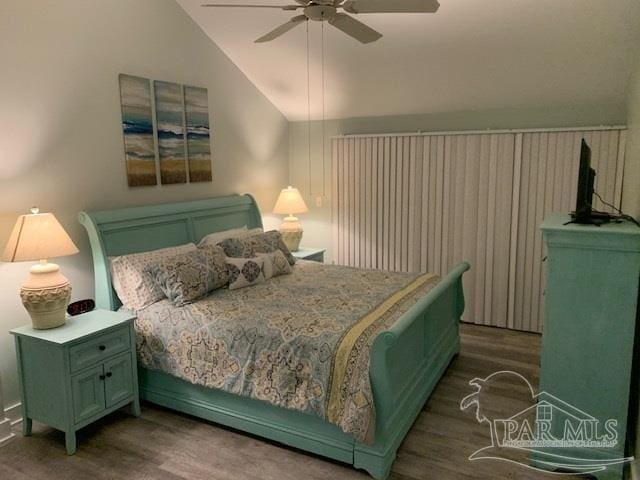 bedroom featuring ceiling fan and vaulted ceiling