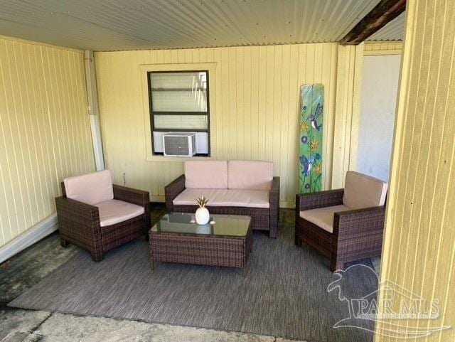 view of patio / terrace with an outdoor living space and cooling unit