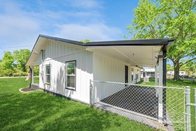 view of home's exterior featuring a yard