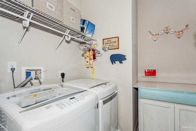 laundry room featuring separate washer and dryer