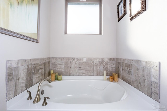 bathroom with a washtub