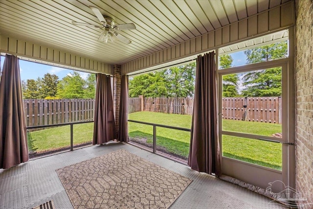 6372 Ladera Trl, Pace, FL 32571 - unfurnished sunroom with a ceiling fan