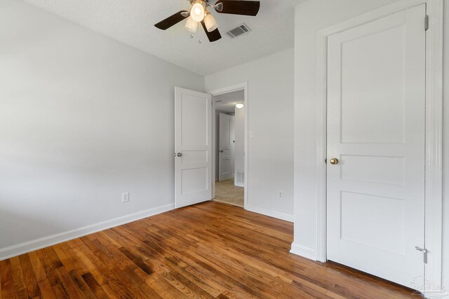 full bathroom featuring tile patterned flooring, shower / tub combo with curtain, toilet, and sink