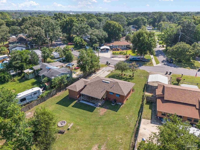 birds eye view of property with a residential view