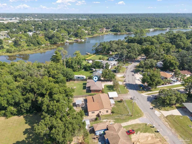 aerial view with a residential view, a water view, and a wooded view