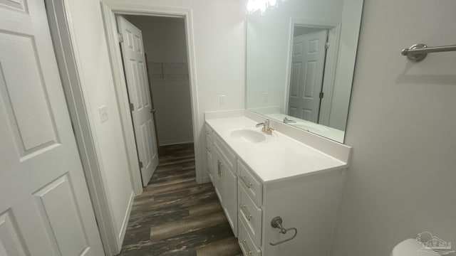 bathroom featuring vanity and wood finished floors