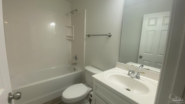 bathroom with toilet, shower / washtub combination, and vanity