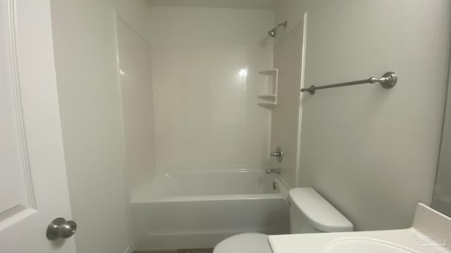 bathroom with vanity, toilet, and tub / shower combination