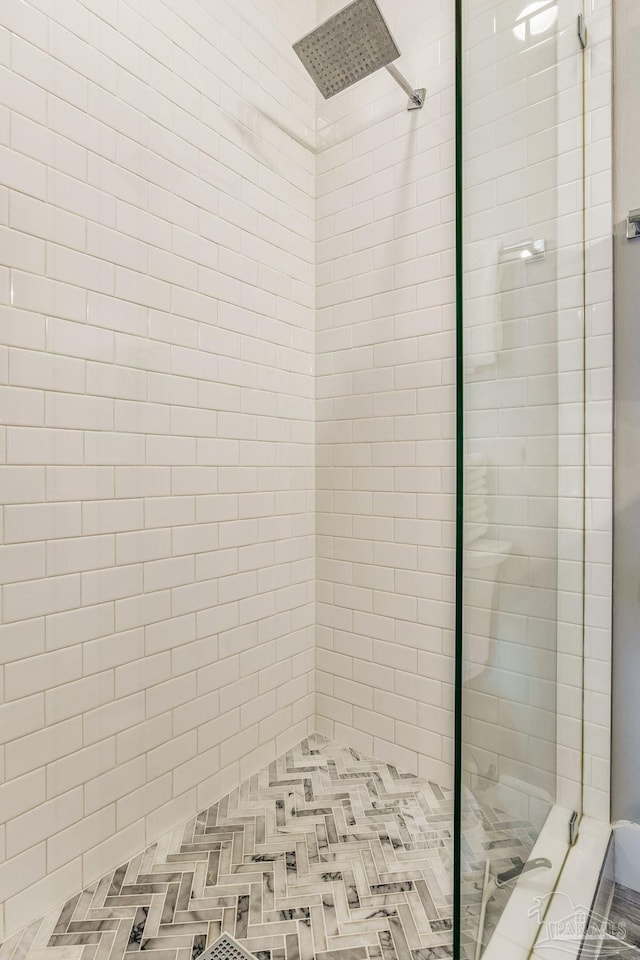 bathroom featuring a stall shower