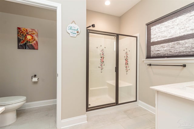 bathroom featuring walk in shower, tile patterned flooring, vanity, and toilet