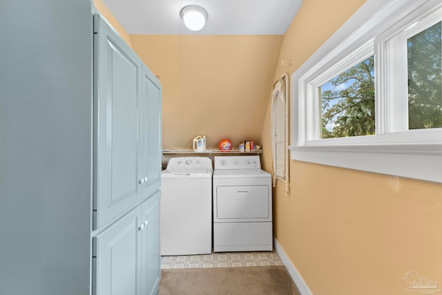 laundry area with separate washer and dryer and laundry area