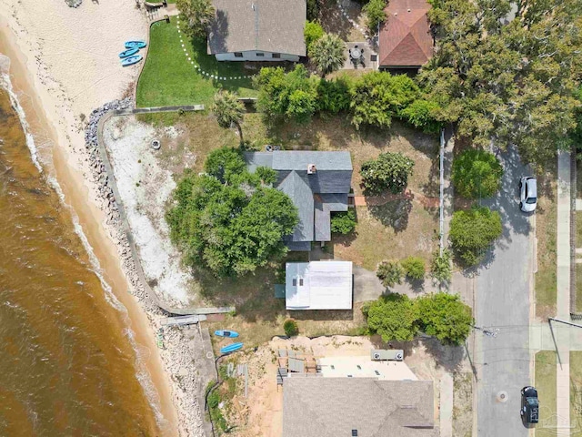 aerial view featuring a view of the beach and a water view