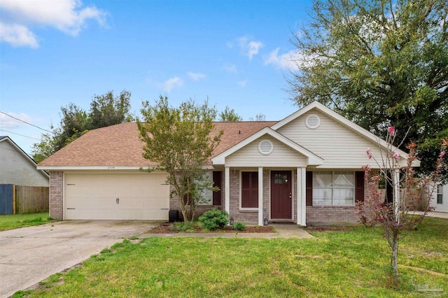 4709 Constellation Dr, Gulf Breeze, FL 32563 - view of front of property with fence, an attached garage, brick siding, concrete driveway, and a front lawn