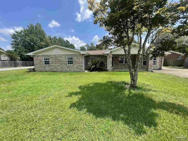 ranch-style house with a front yard